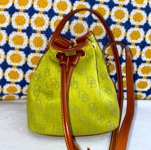EUC DOONEY & BOURKE MICRO SADDLE BUCKET BAG. RARE! Bright green monogrammed.